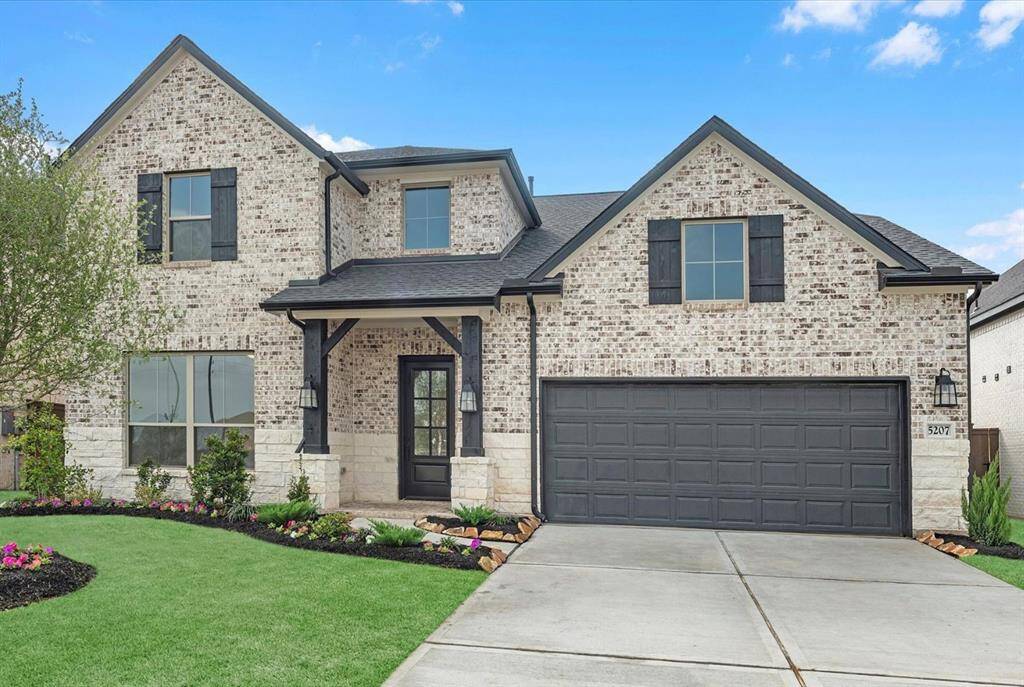 MOVE IN READY!! Westin Homes NEW Construction (Wimberly II, Elevation B) Two Story. 4 bedrooms, 3.5 baths. Green grass added to enhance photo.