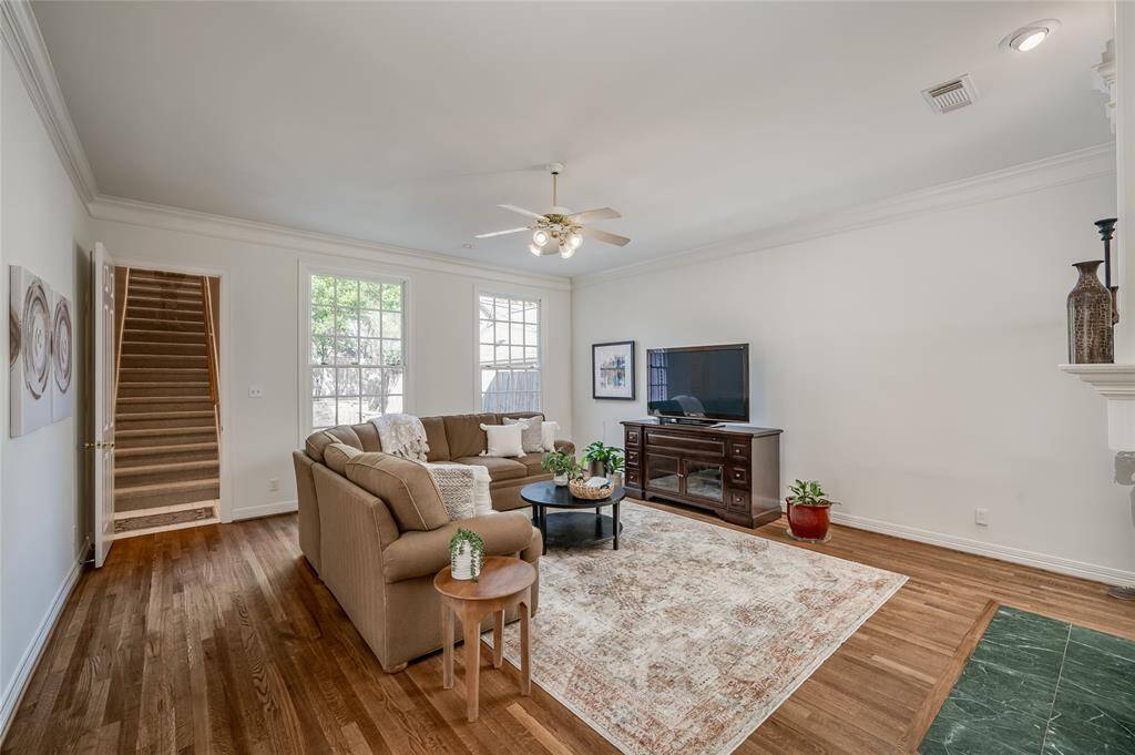 The back door provides easy access to the garage and backyard, while upstairs features a convenient guest suite/game room.