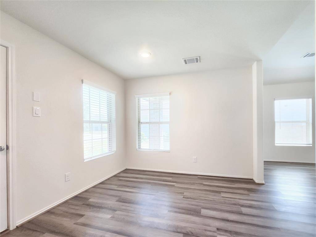 This picture has been virtually staged Family Room with view of Dining area