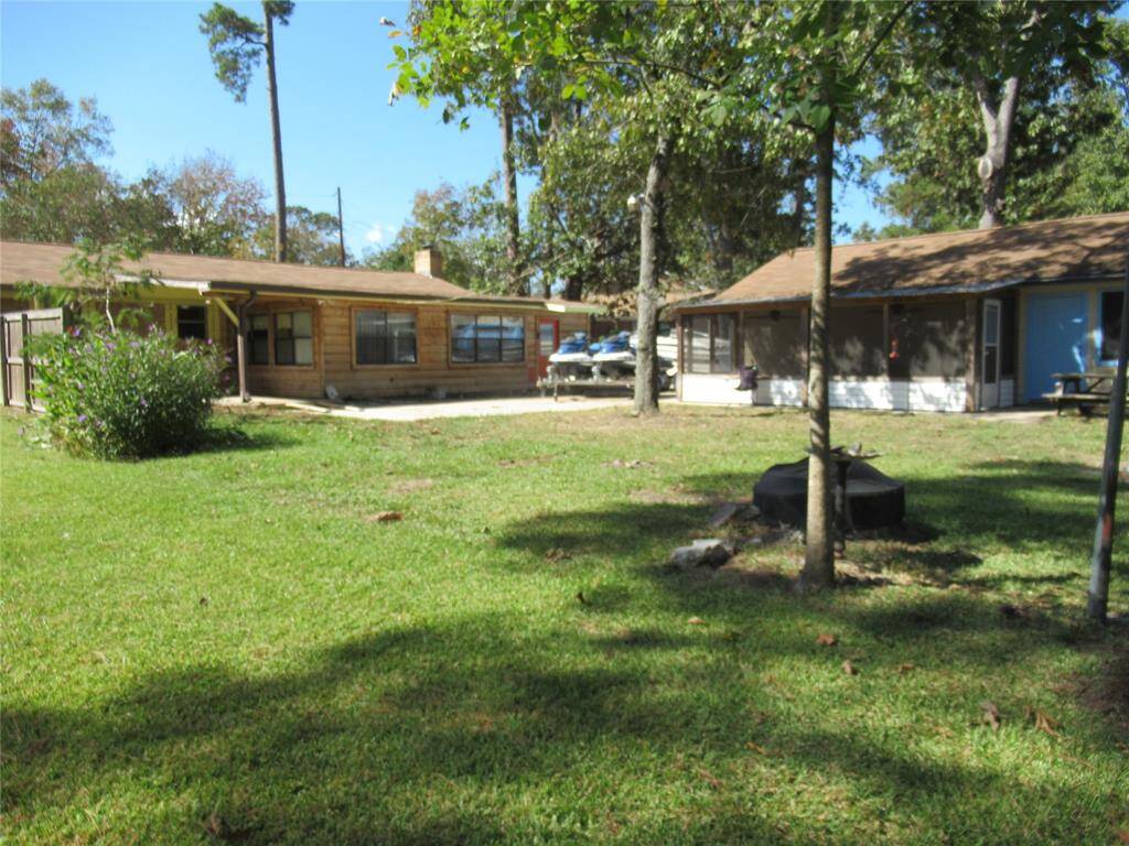 This home has lovely outdoor space.  Large uncovered patio, smaller covered one and enclosed porch off the garage.