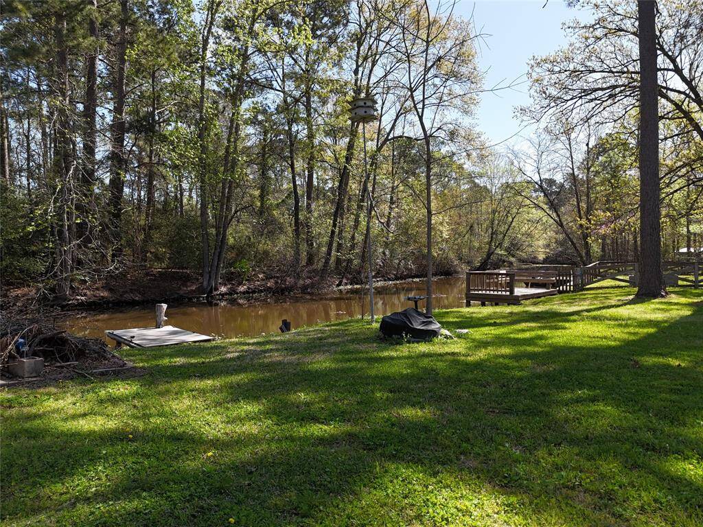 View from garage side of home. Near the screened porch..