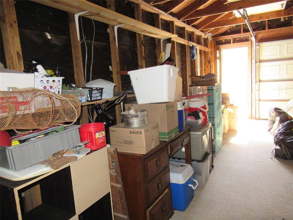 Garage is plenty big enough for additional storage space.