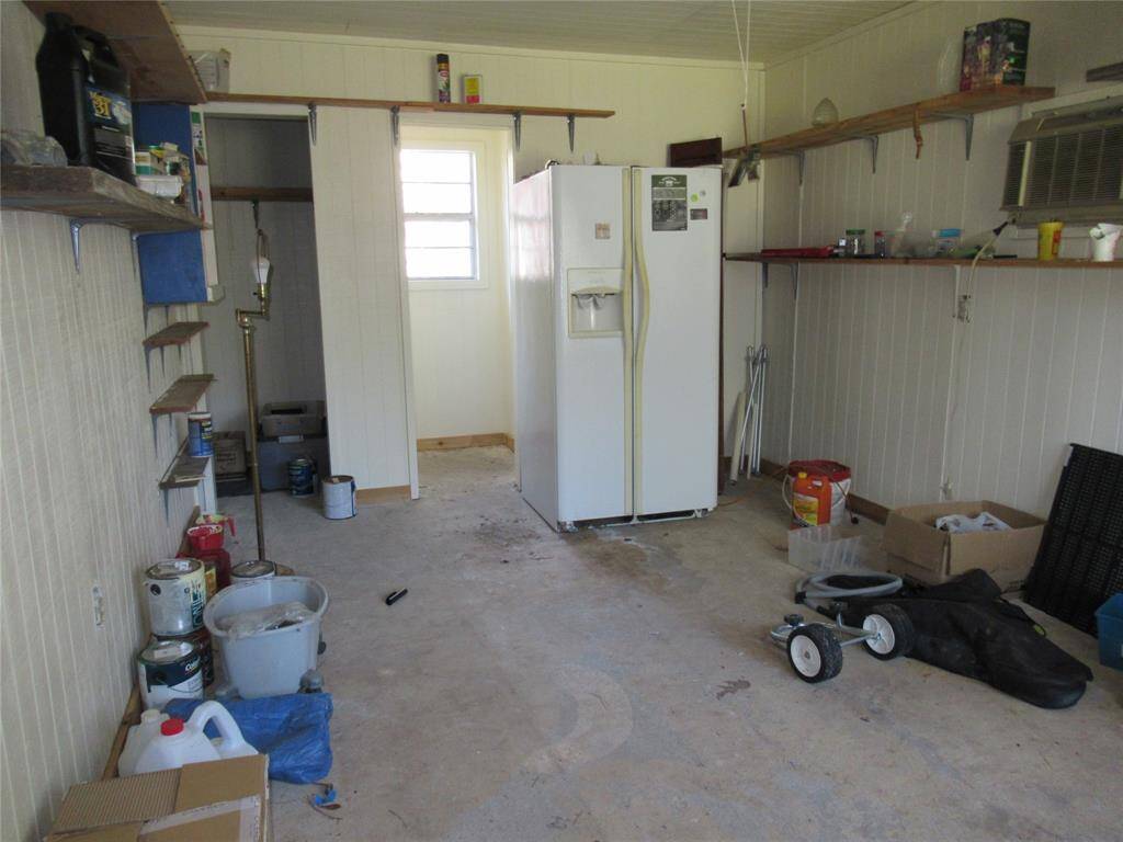 Space for workshop is attached to the backside of the  garage.