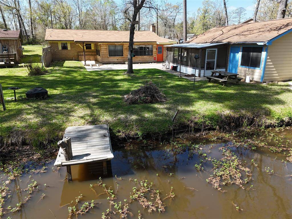 Our drone got you a pic of your back yard looking from the creek side.  No immediate neighbors across the creek from this home.