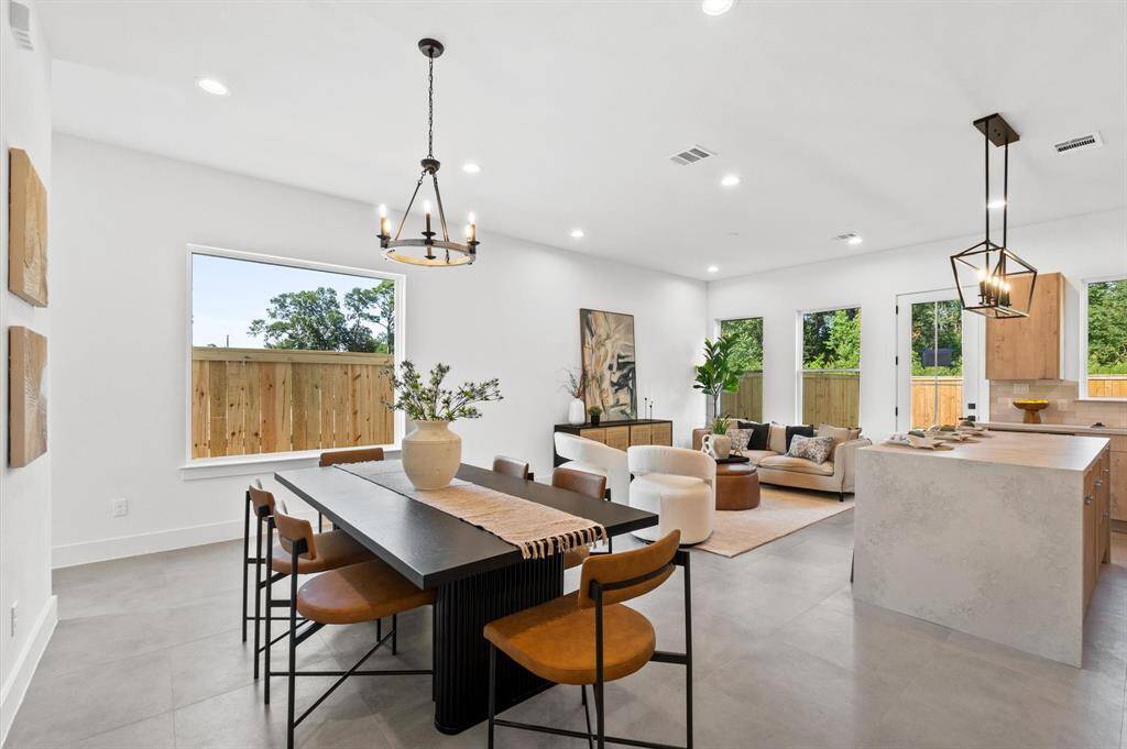 Open concept through the kitchen, dining, and living room.