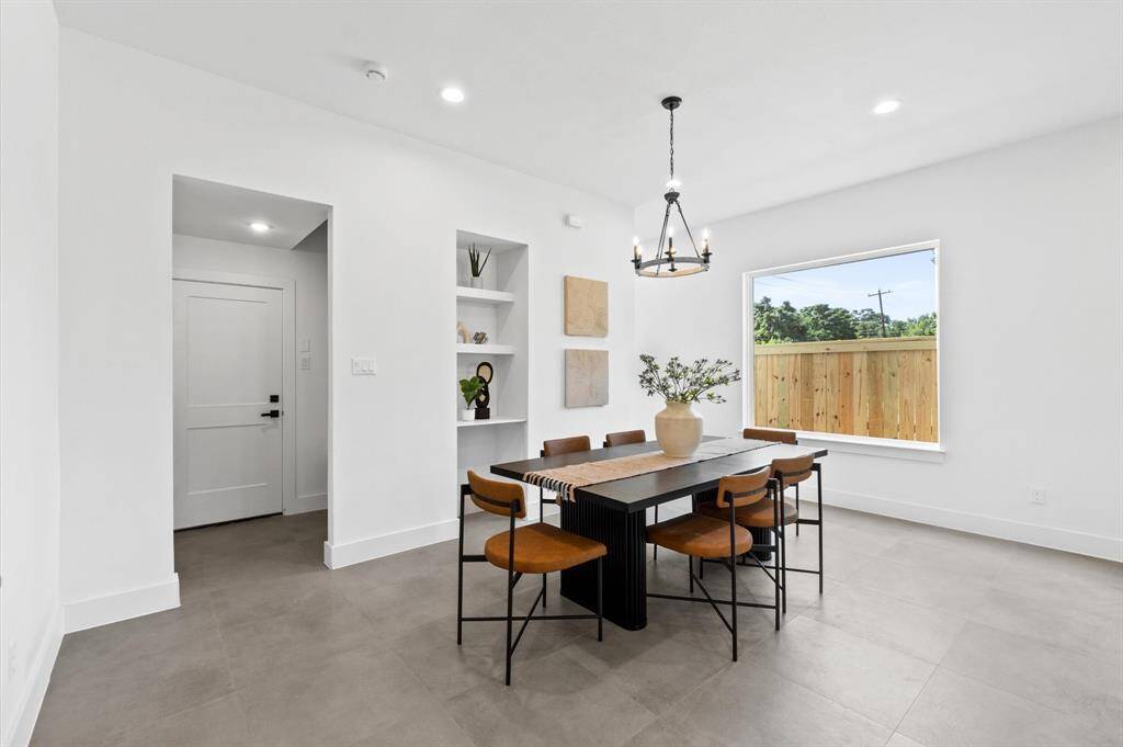 Flow through space obtaining your kitchen, breakfast bar, dining, and living room!