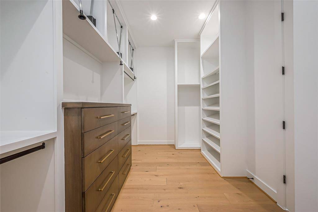 Primary closet has custom modular systems