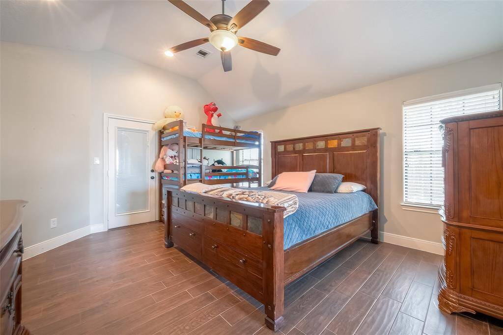 Large primary bedroom includes THREE closets for tons of storage.