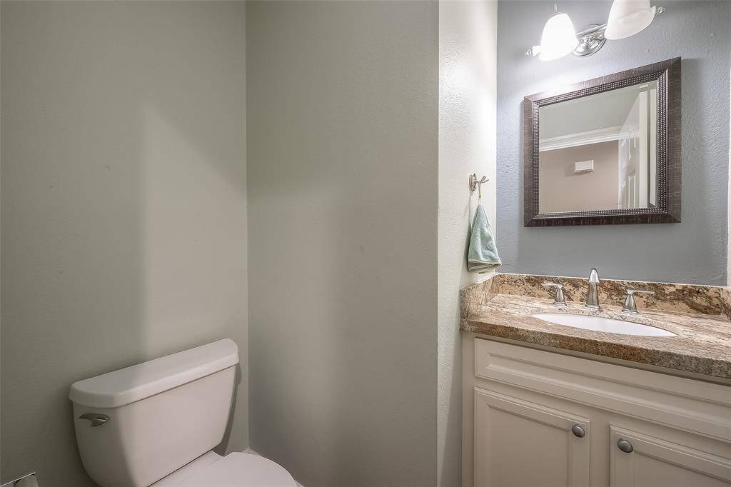 The half-bath is located right off the family room.