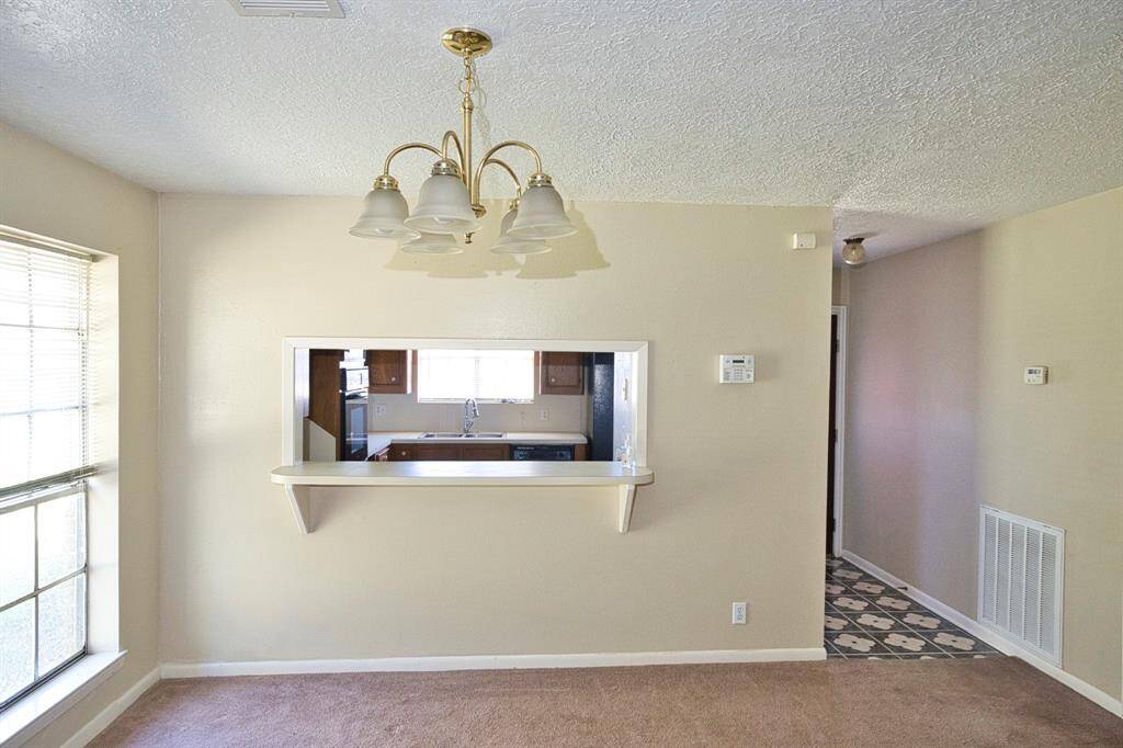 Breakfast bar opens to the Dining/Living are