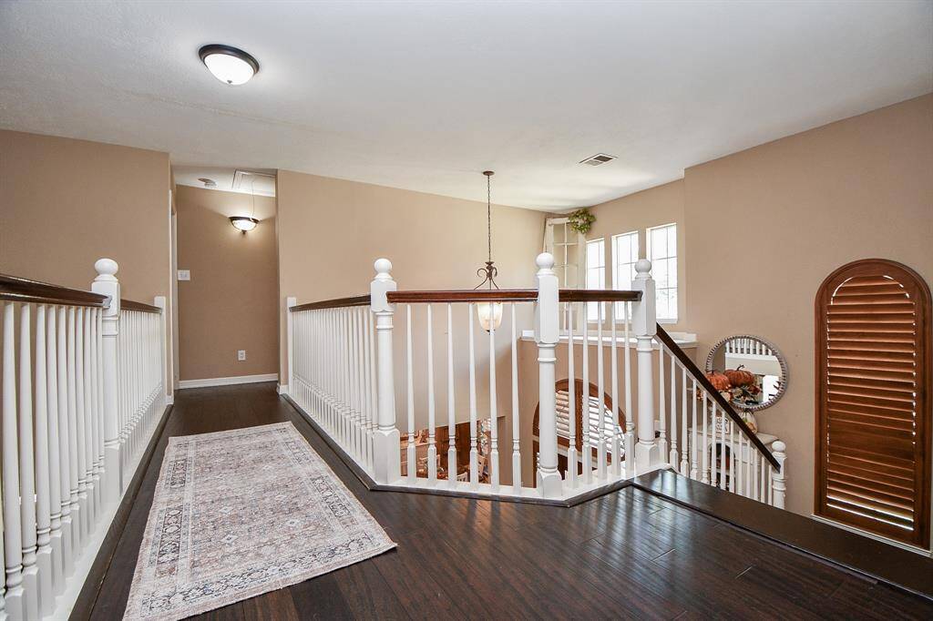 More bamboo flooring casts an elegant glow on paths to upstairs bedrooms.