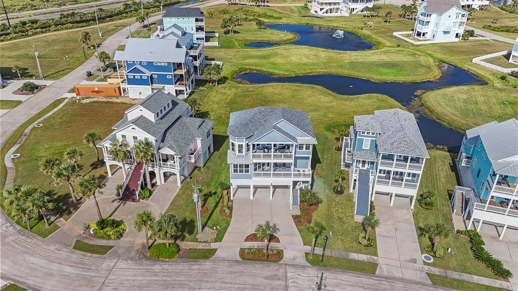 A closer look at the beautifullylandscaped homes surroundingserene ponds with fountains,perfect for peaceful coastalliving.