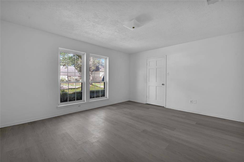 Another view of the Primary bedroom... newer flooring...