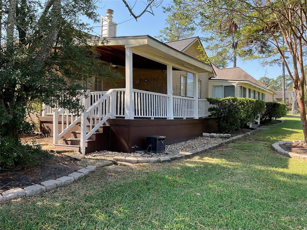 View of the stairs that lead up to the back porch.