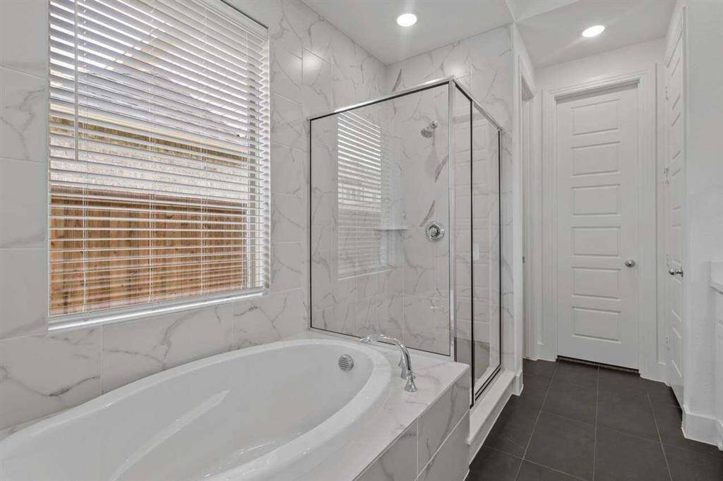 Separate Tub and Shower at Primary Suite - Representative Photo