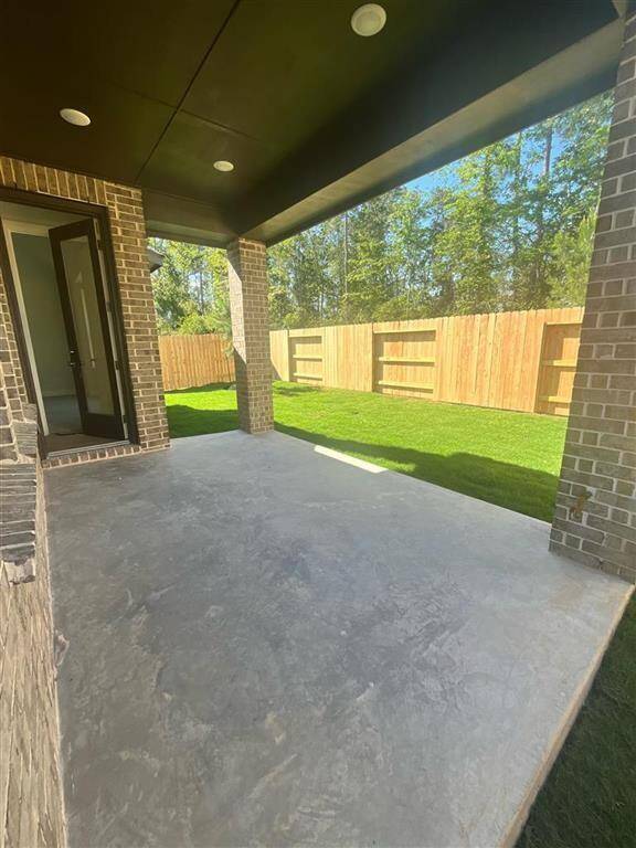 Extended Back Patio and Gorgeous Backyard View