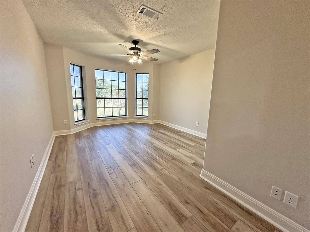Spacious upstaris Bedroom with views of the pond and front fields