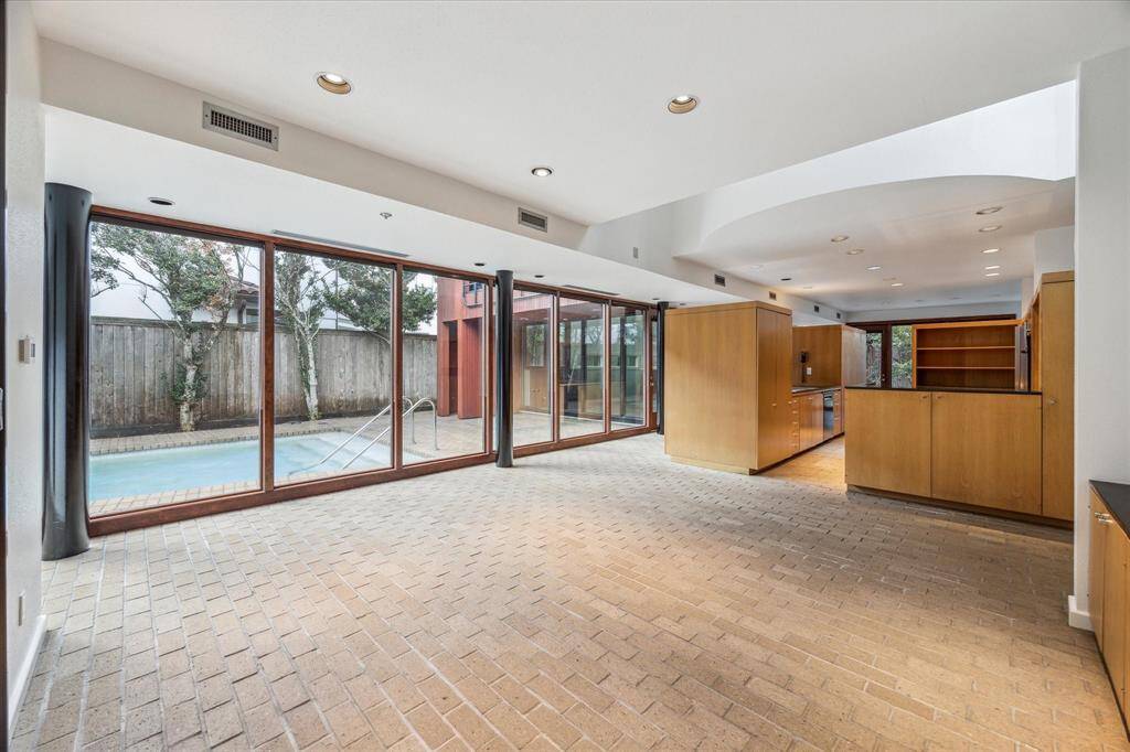Recently sealed brick floors (10/24) complete the downstairs and  the pool deck.
