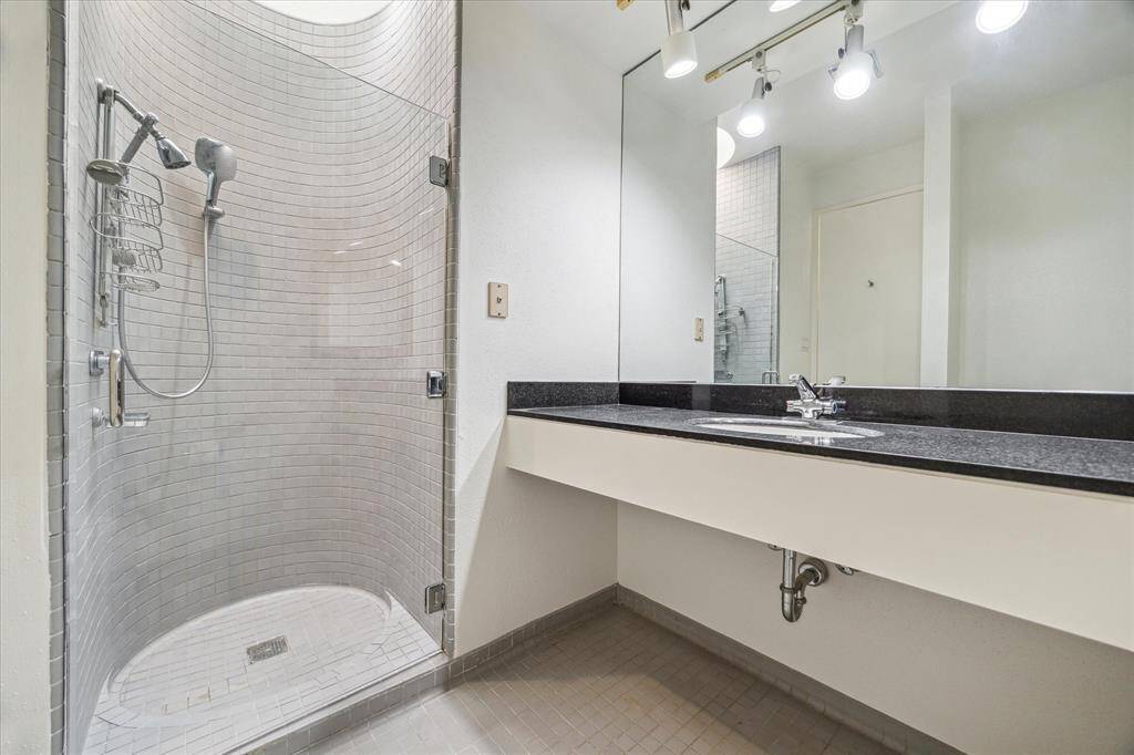 One of the primary bathrooms upstairs with a shower.