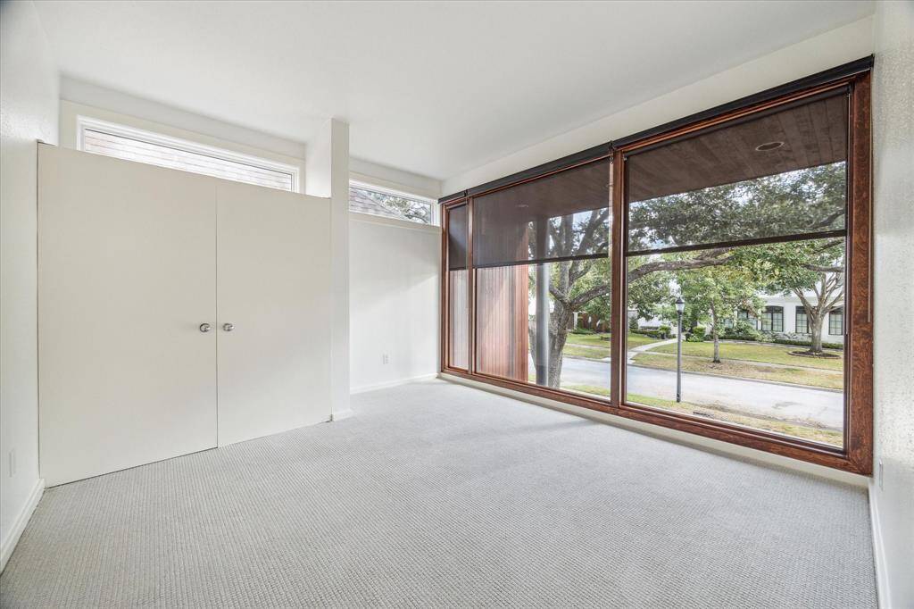 The secondaary bedoom overlooking Westchester.  Shades and also room darkening shades in both secondary bedrooms.