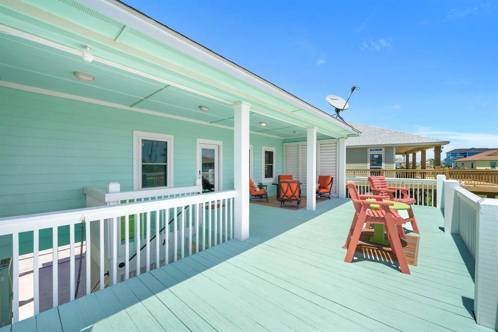 Large Deck and covered stairwell coming up has a locking door at the bottom which is perfect for security for out of town owners.