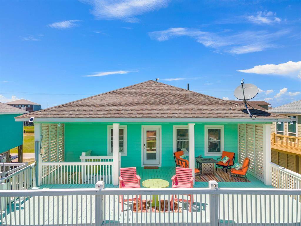 This large deck has a new fire feature table and has a VIEW of the Beach!
