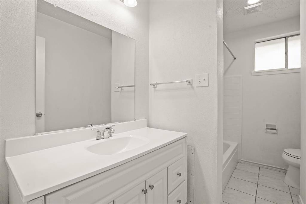 The secondary full bathroom.