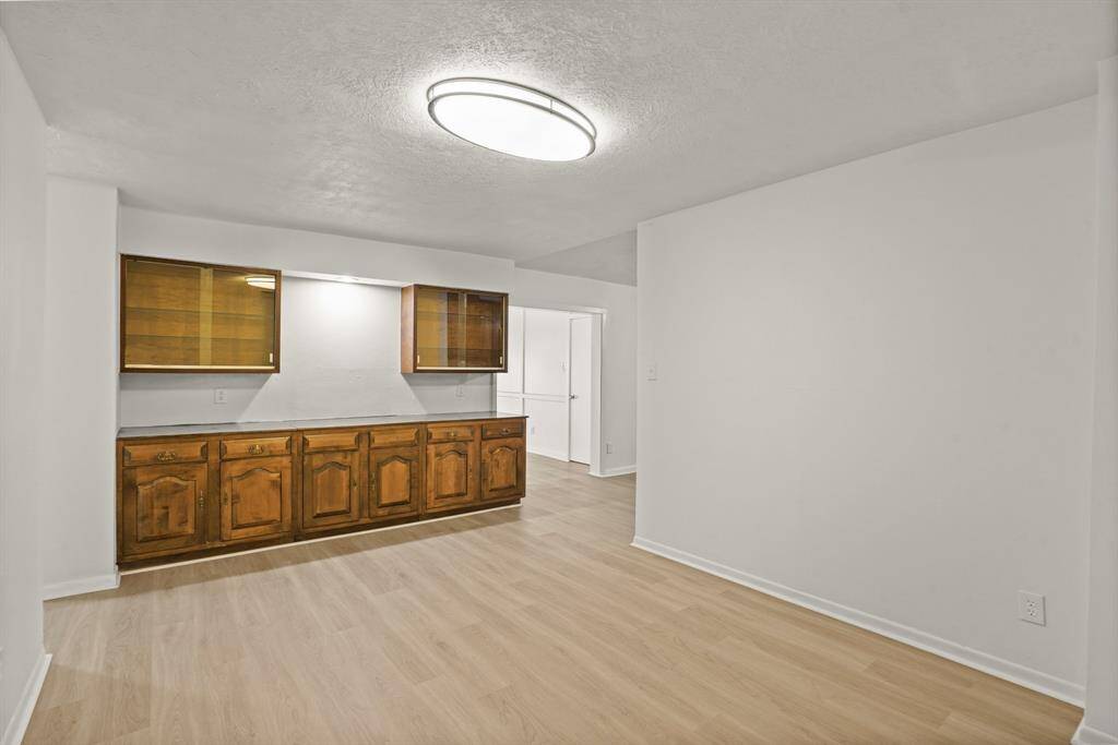 Custom built cabinetry in the formal dining space makes for convenience and ease for entertaining.
