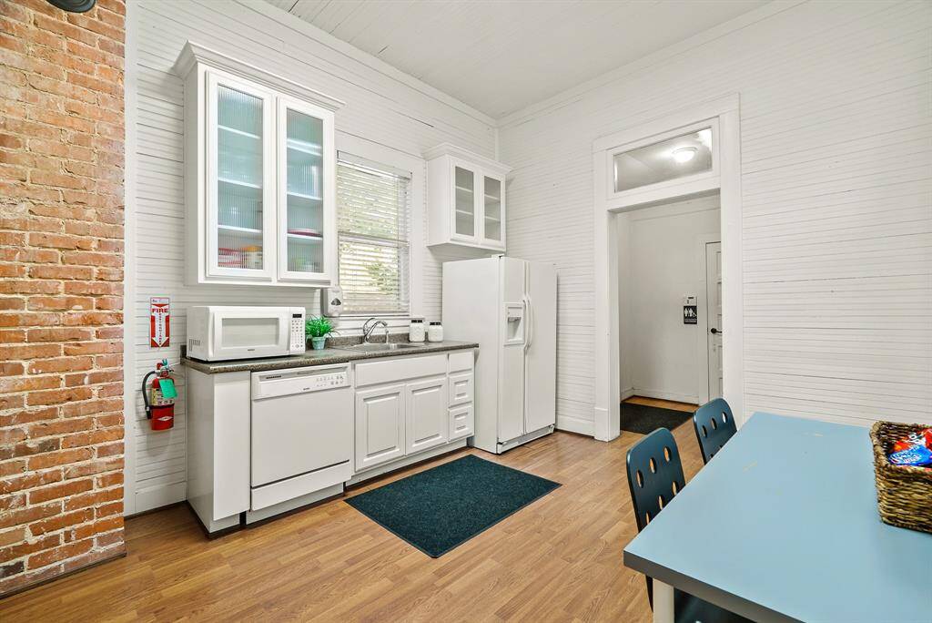 This centrally positioned Kitchen is a great place to meet up and unwind over lunch. The room comes equipped with beadboard walls and ceiling, cased openings, granite countertops, dual-basin stainless steel sink, and whisper quiet dishwasher.