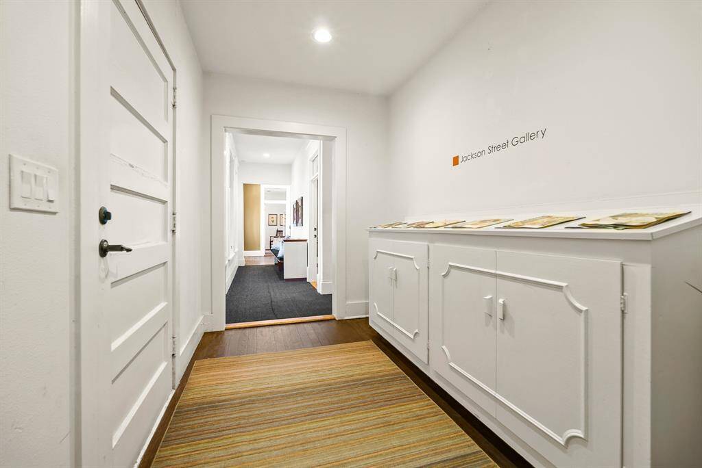 This extra-wide hallway provides an ideal transition between Offices. Display your company’s accolades and designs for all to see!