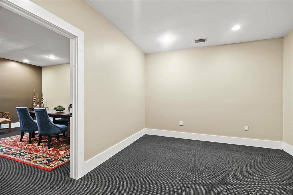 This step back shows how these two Offices can act as one large space, or function as two by closing the door to the right. One could be an Office while the other acts as a Conference or Meeting Room.