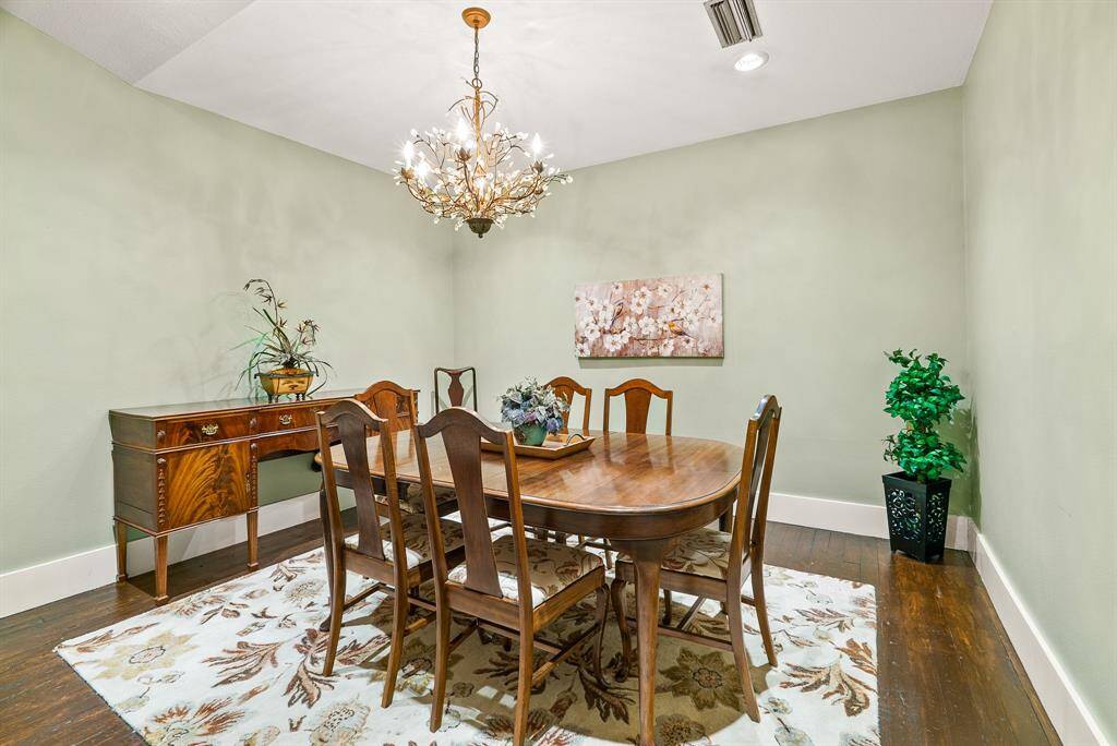 This Office, currently functioning as an additional Conference Room, boasts original hard wood flooring and wide baseboards. With the room being so spacious, it can accommodate a variety of furniture and layouts.