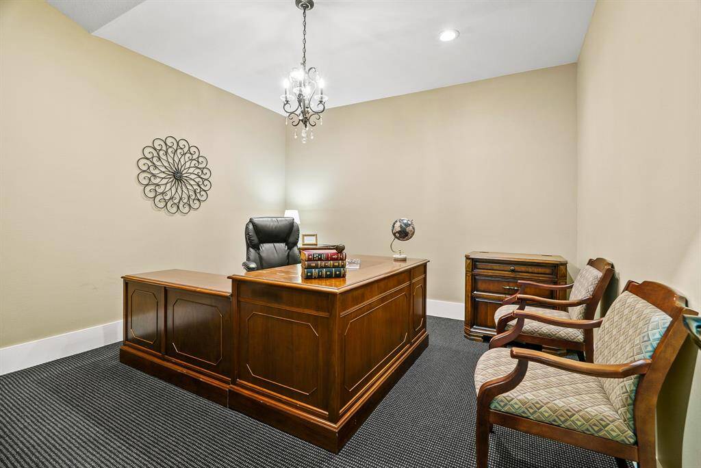 This Office space boasts all the same features as the previous one. With tall ceilings and a neutral color pallet this space can function any way you need. Next to this office space sits an additional room behind a frosted glass door sits another single office space.