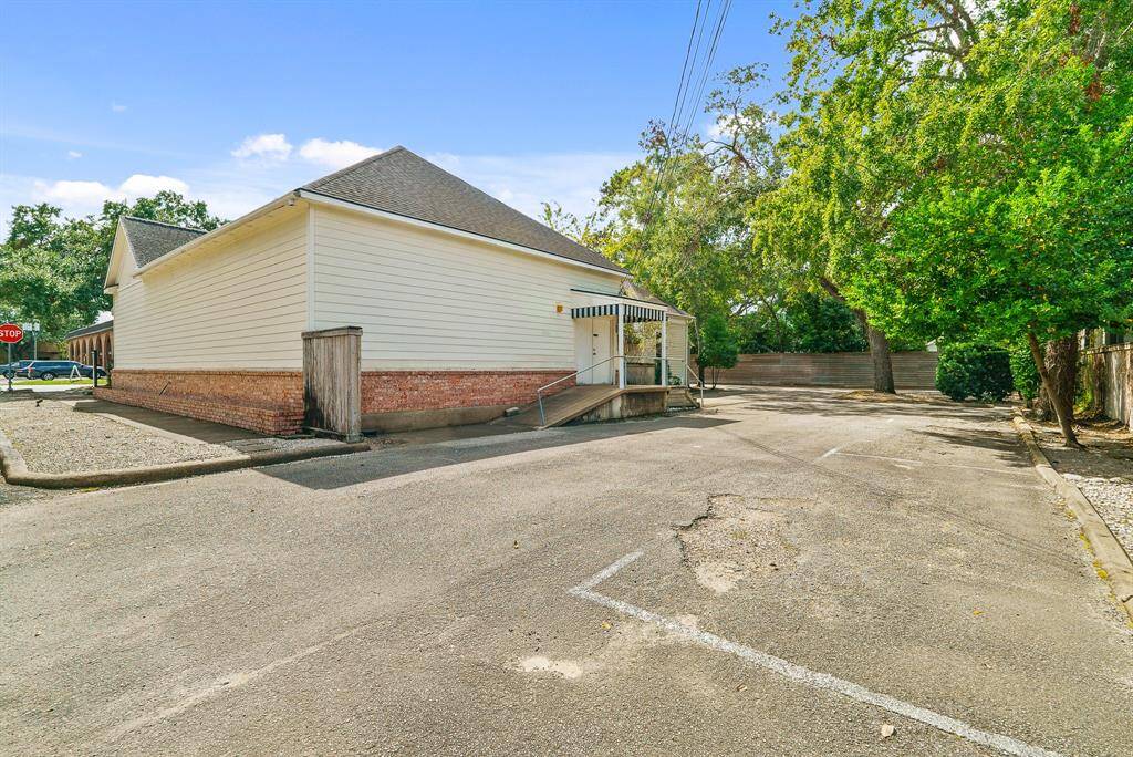 This highly desirable corner lot property features a large floorplan, 19th century charm, and plenty of parking. This gem is ready to house your business!