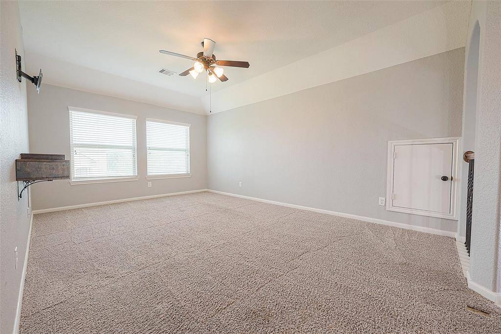 Expansive game room offering ample space for entertainment and relaxation.