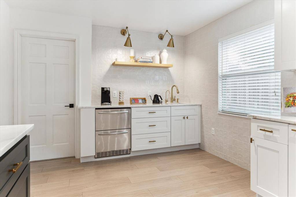 Coffee bar (2022) with built in refrigerators, sink and storage