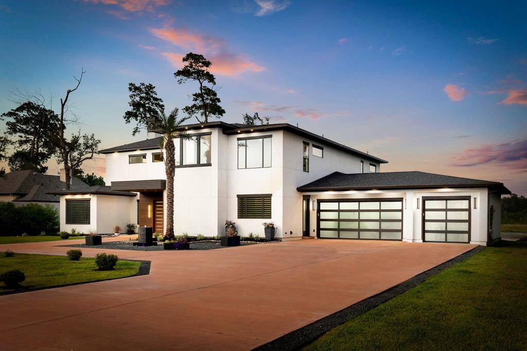 Benders Landing Estates is a premier community offering private lakes and mature trees. This contemporary beauty rests on an acre lot taking in expansive water views.