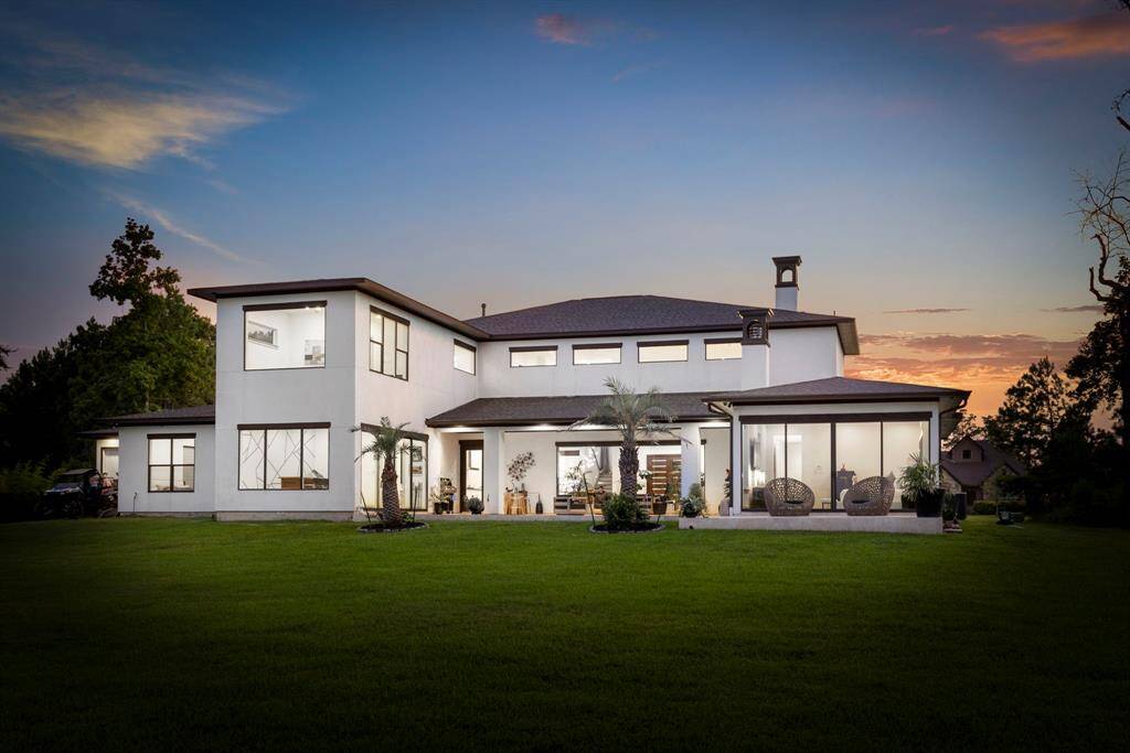 Taking full advantage of a spectacular lot, the home offers expansive green space that is both private and serene.