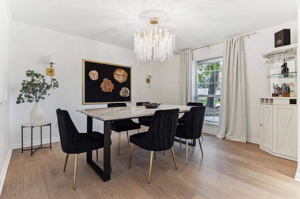 Dining Room with custom made table is a perfect spot to entertain guests