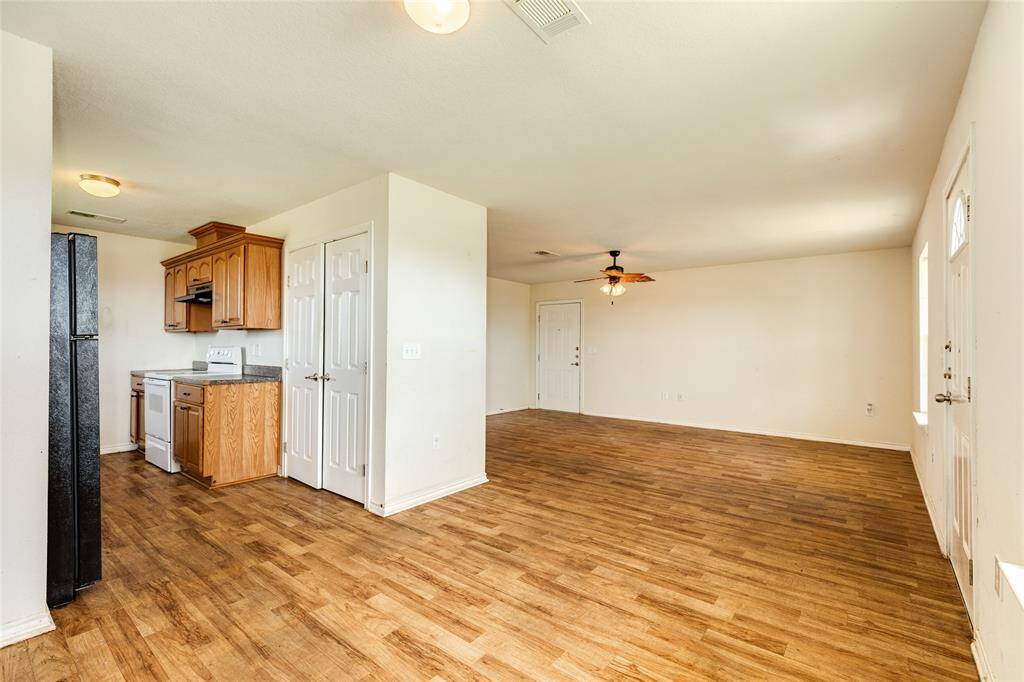 View of living and kitchen from dining area