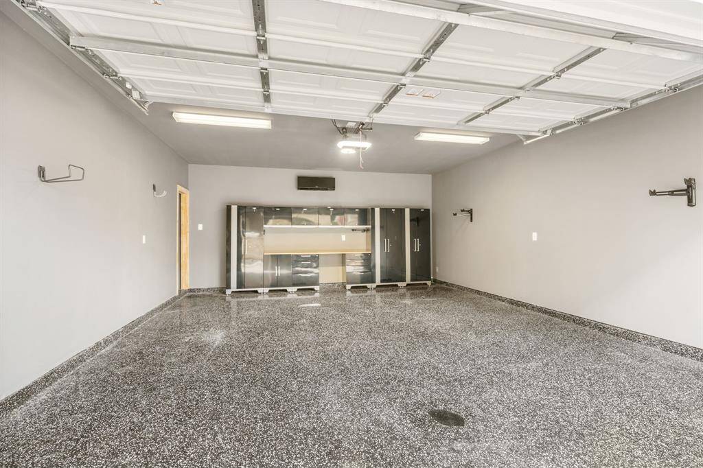 The floors are epoxy and ready for your next exotic car to sleep in.