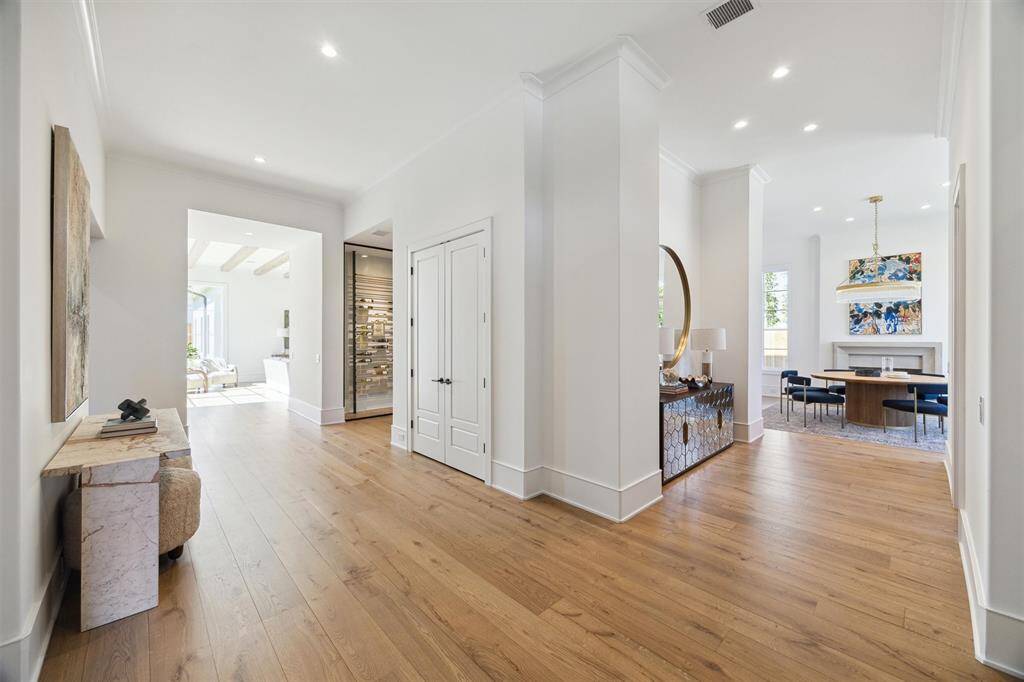 White oak hardwood flooring throughout the home.