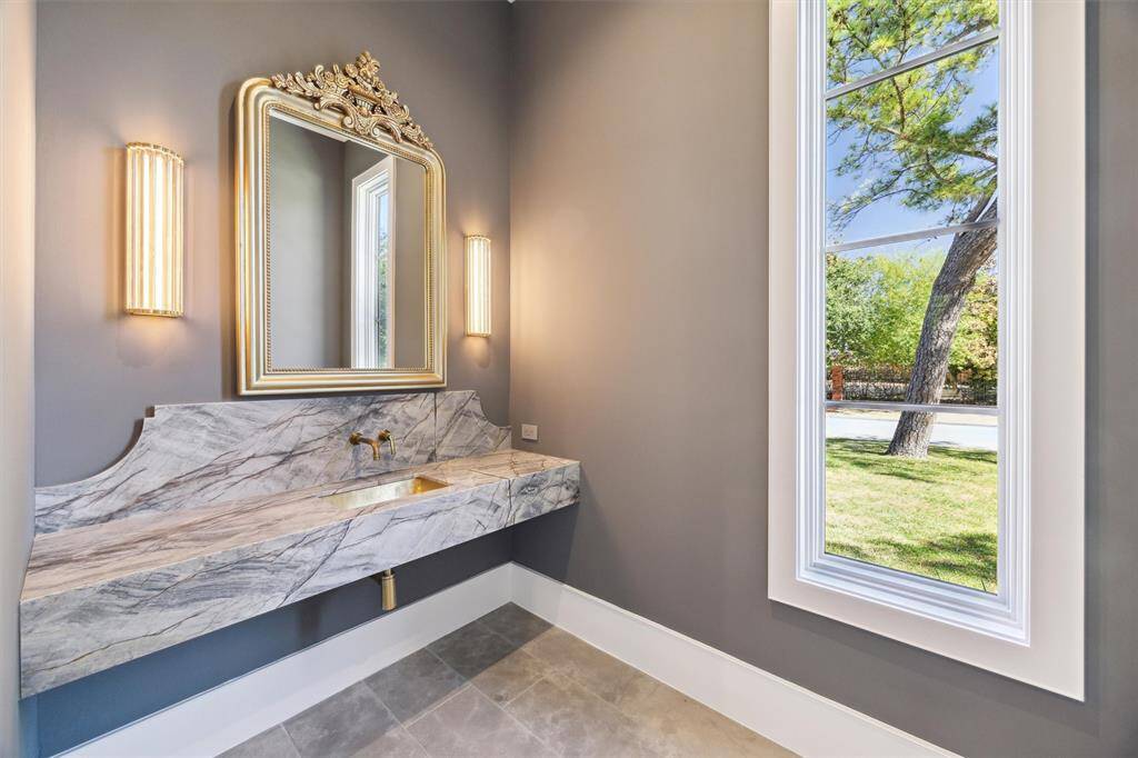 Stunning powder room.  1 of 2 half baths on the first floor.