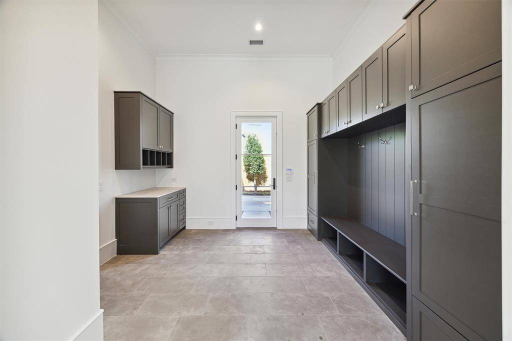 Side entry and mud room off the garage.