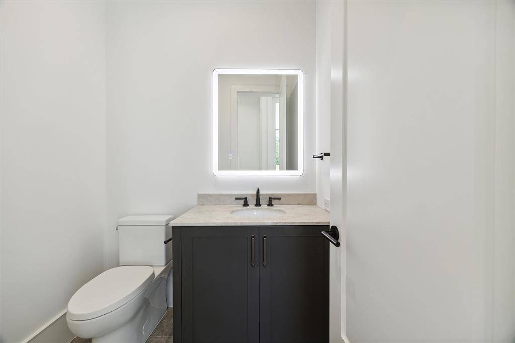 Second half bath on the first floor with easy access to the back yard.