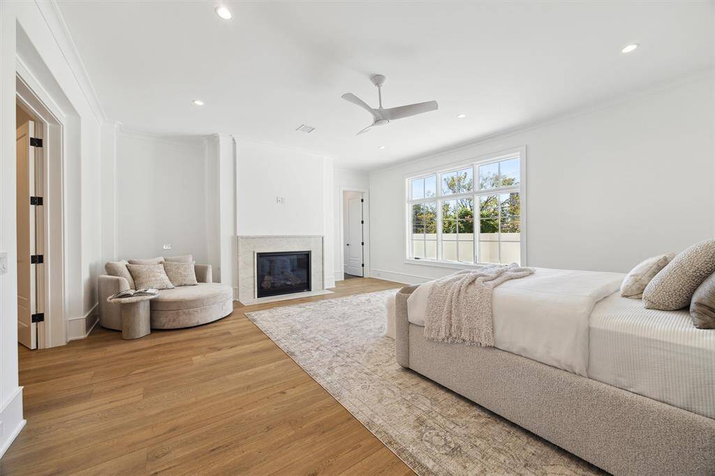 Primary Bedroom located on the 2nd floor with fireplace and separate sitting room/flex room.