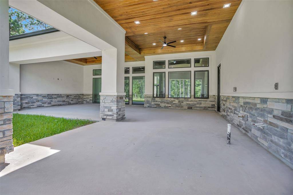 Huge oversized outdoor space is already plumbed for an Outdoor Kitchen and equipped with 2 shielded CAT6A (Ethernet/Data) and shielded coaxial (TV) cables.