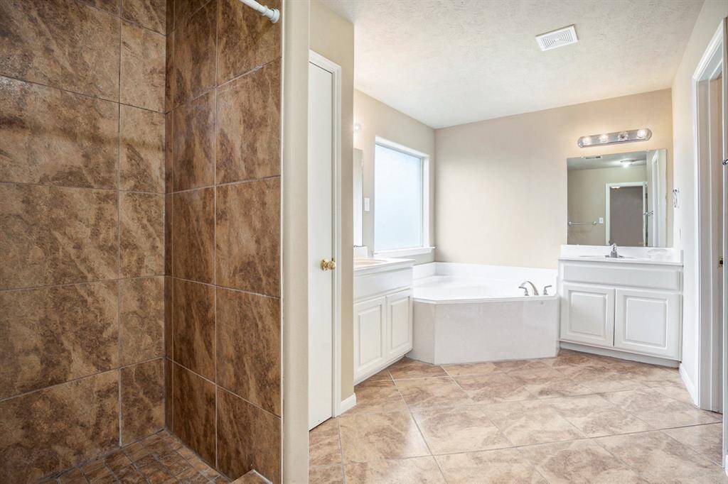 Check out the Coffered Ceiling Primary BR with ceiling fan