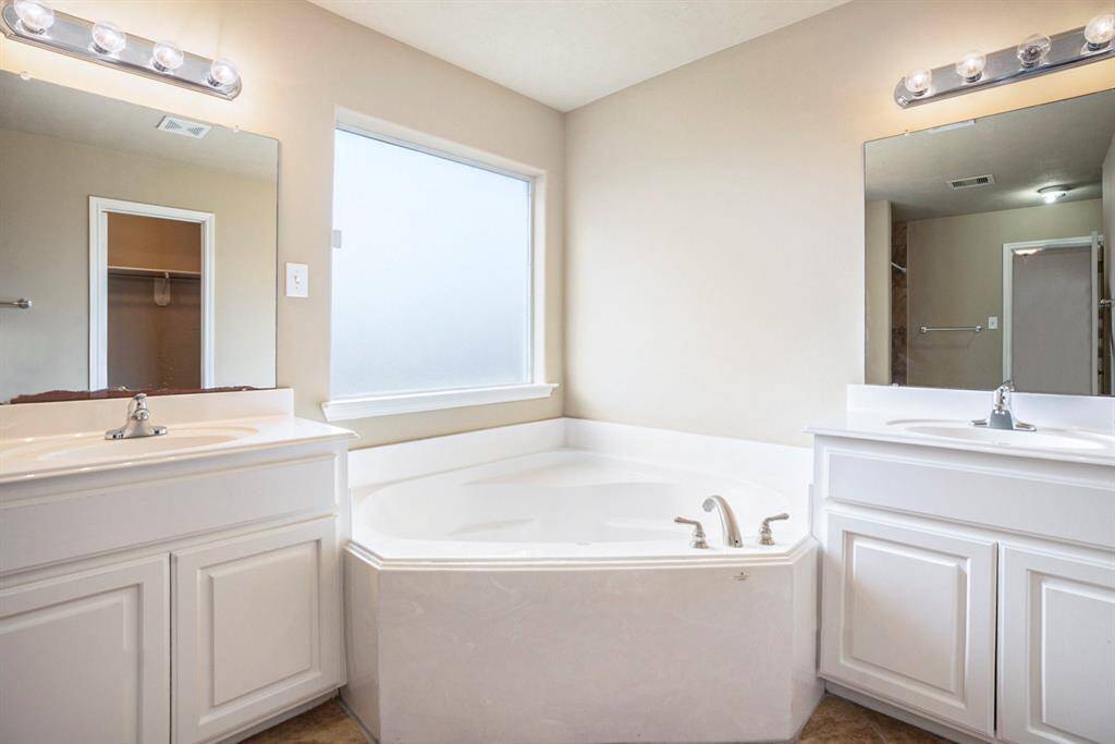 Primary Bath with walk-in Shower, and deep soaking tub