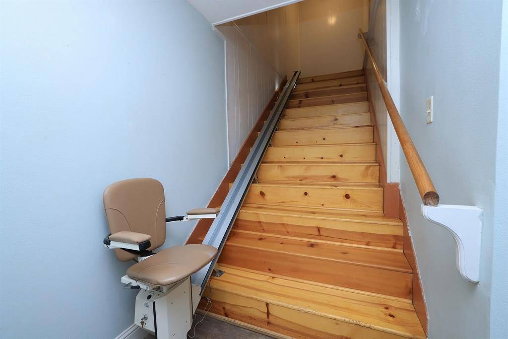 The back stair case is off of the kitchen and includes a lift chair in case you need a little help getting to the 2nd floor.
